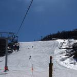 Going Up The Quad Lift. Looking Up White Lighting.