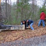 Dustin & Josh Trying To Pick Up The Hammer On The Trackhoe. 