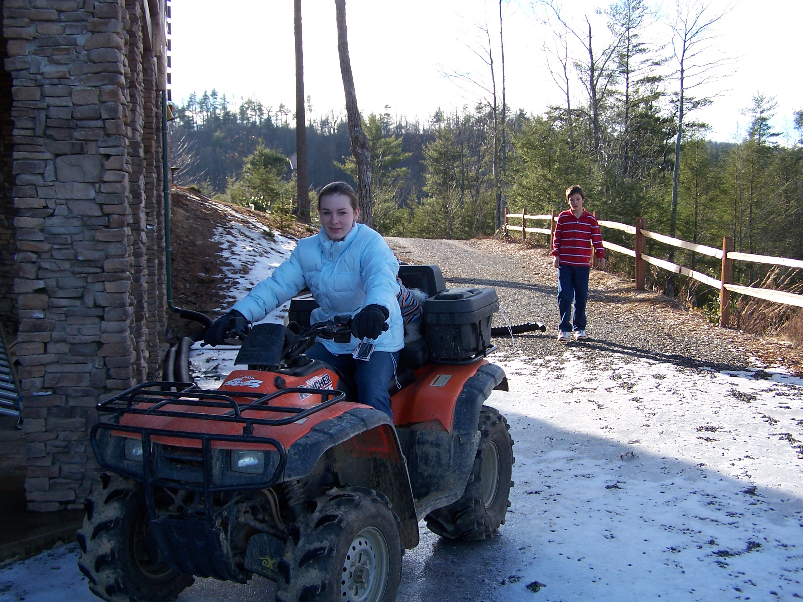 Still Got Snow! Kristen & Austin Coming Around The Back.