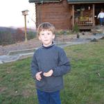 Britton Getting Ready To Help Unload the Christmas Tree.