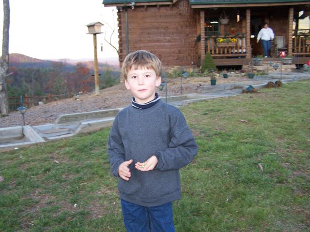 Britton Getting Ready To Help Unload the Christmas Tree.