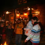 Everyone Gathered Around Making Smores.