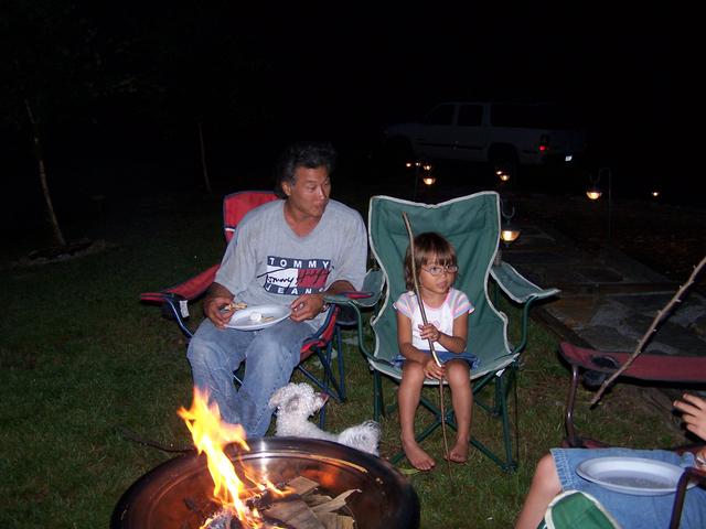 Rick & Zoee' Making Smores By The Fire.