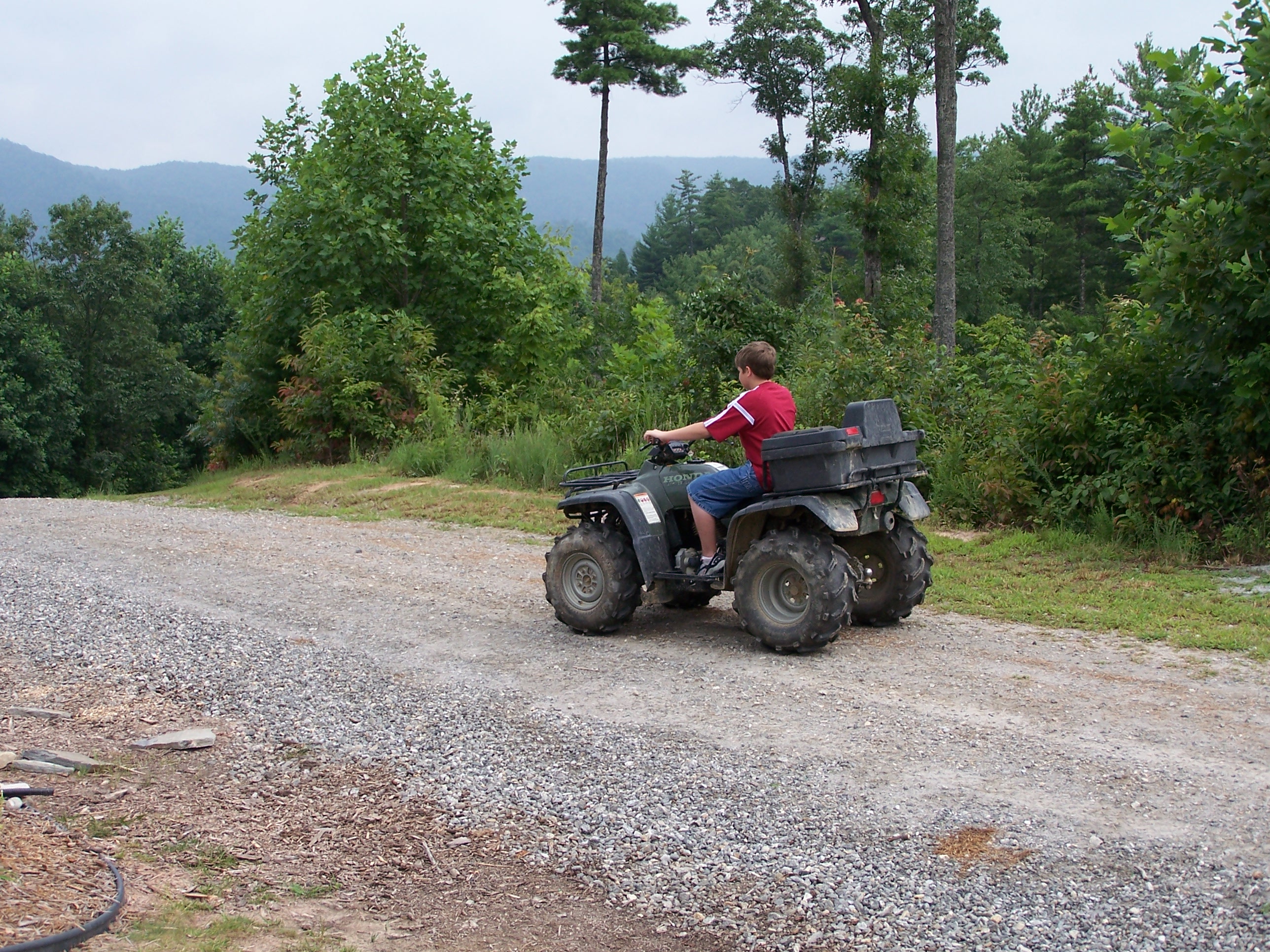 Devin Driving The Four Wheeler