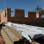 Side View Of Master Bed And Bathroom