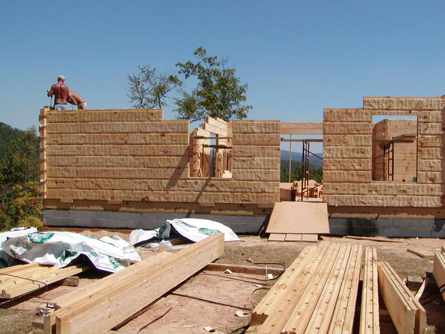 Putting Up Logs From Front Of House In Kitchen