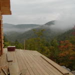 Deck Extended Around House And Main Roof On Back Of House Dried In