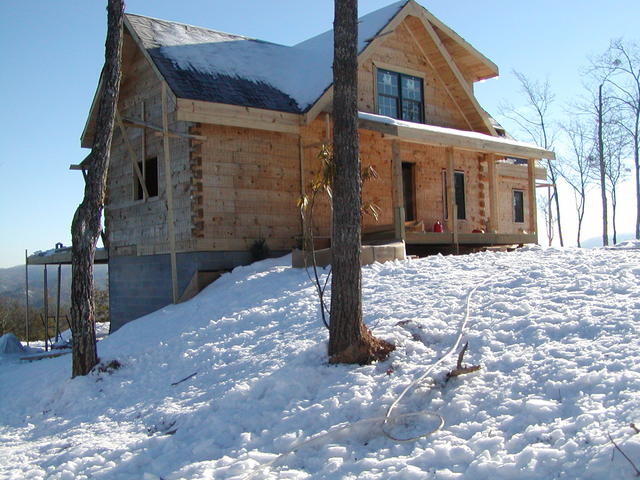 Snow On House