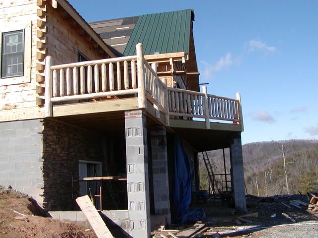 After The Columns Had Been Layed. Lannie And Rex Started Putting The Stone On The Outside.