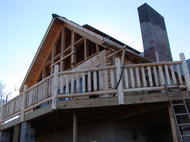 Front Of House And Fireplace Before The Stone.