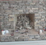 Starting To Look Like A Real Stone Fireplace.