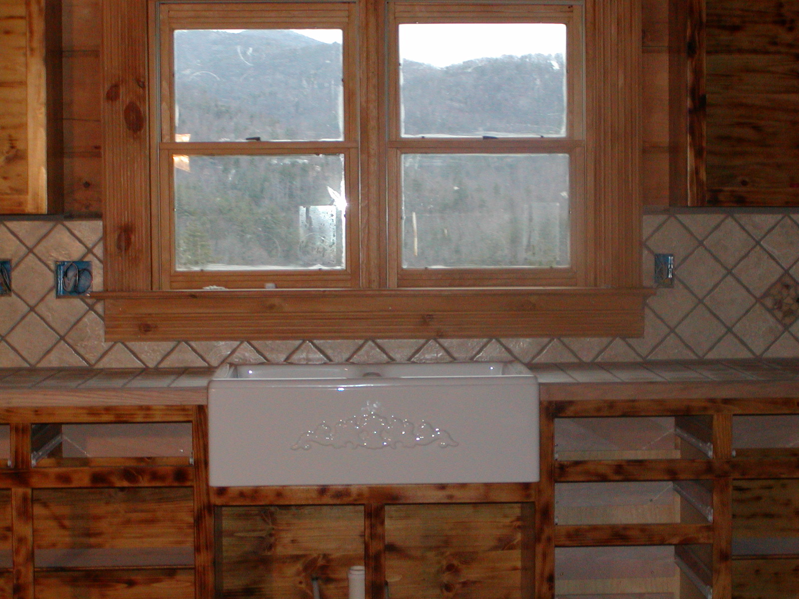 Tile Around The Farm Sink We Installed.