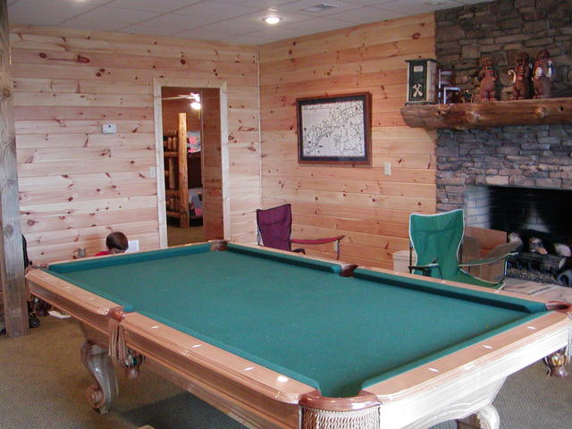 Pool Table In Basement With Fireplace