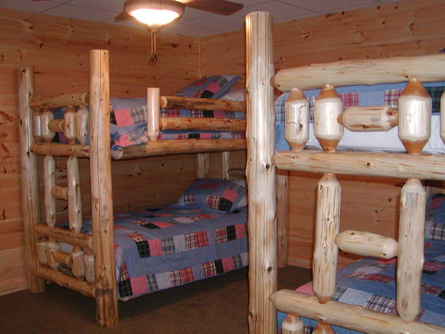 Double log Bunk Beds In Basement Bedroom