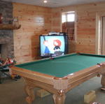 Dustin Watching Big Screen TV In Basement