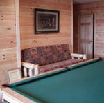 Futon In Basement. Folds Out To Queen Bed