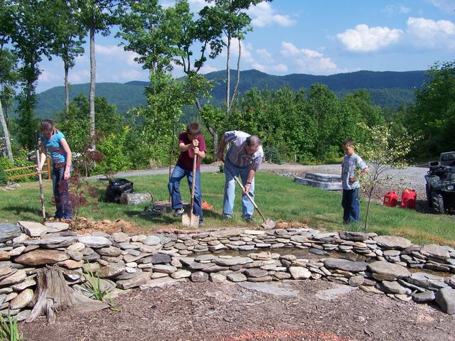 Everyone Digging The Border Around The Stream.