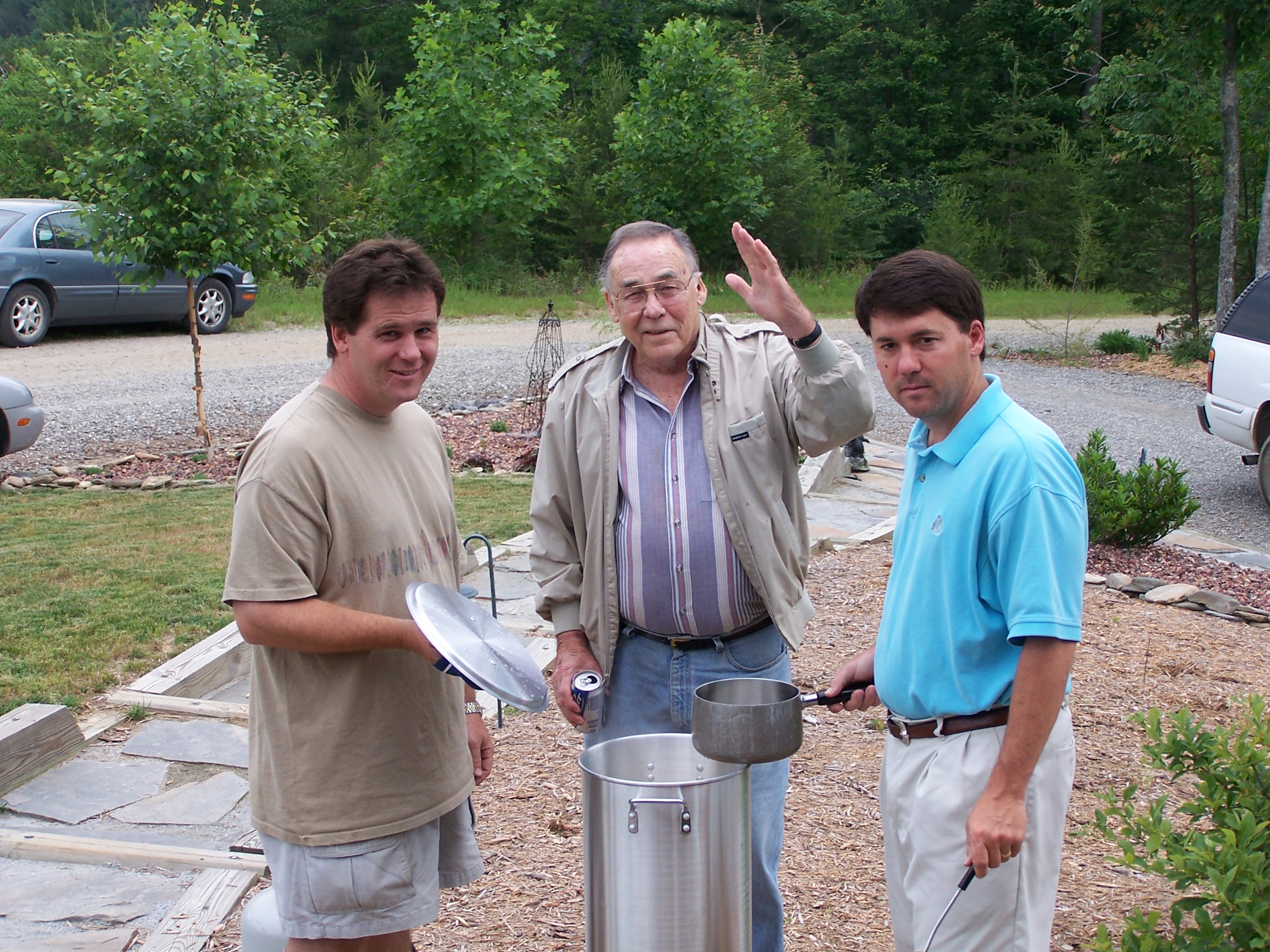 Tracey, Daddy and Scott Cooking The Shrimp Boil.