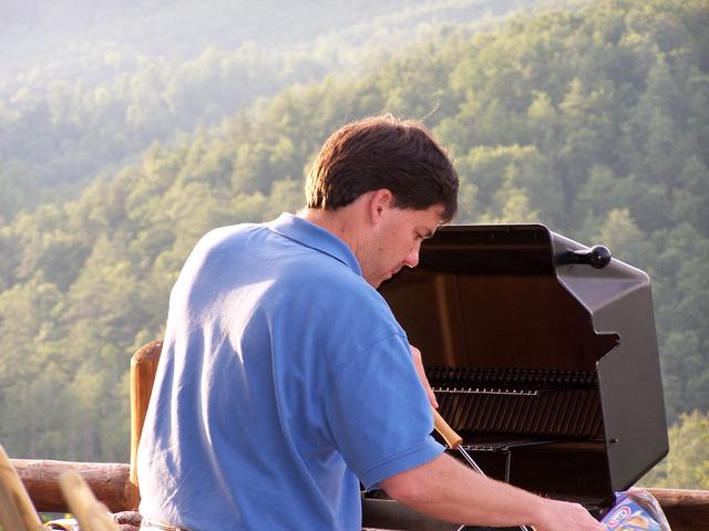 Scott Getting The Grill Ready For Burgers and Dogs.