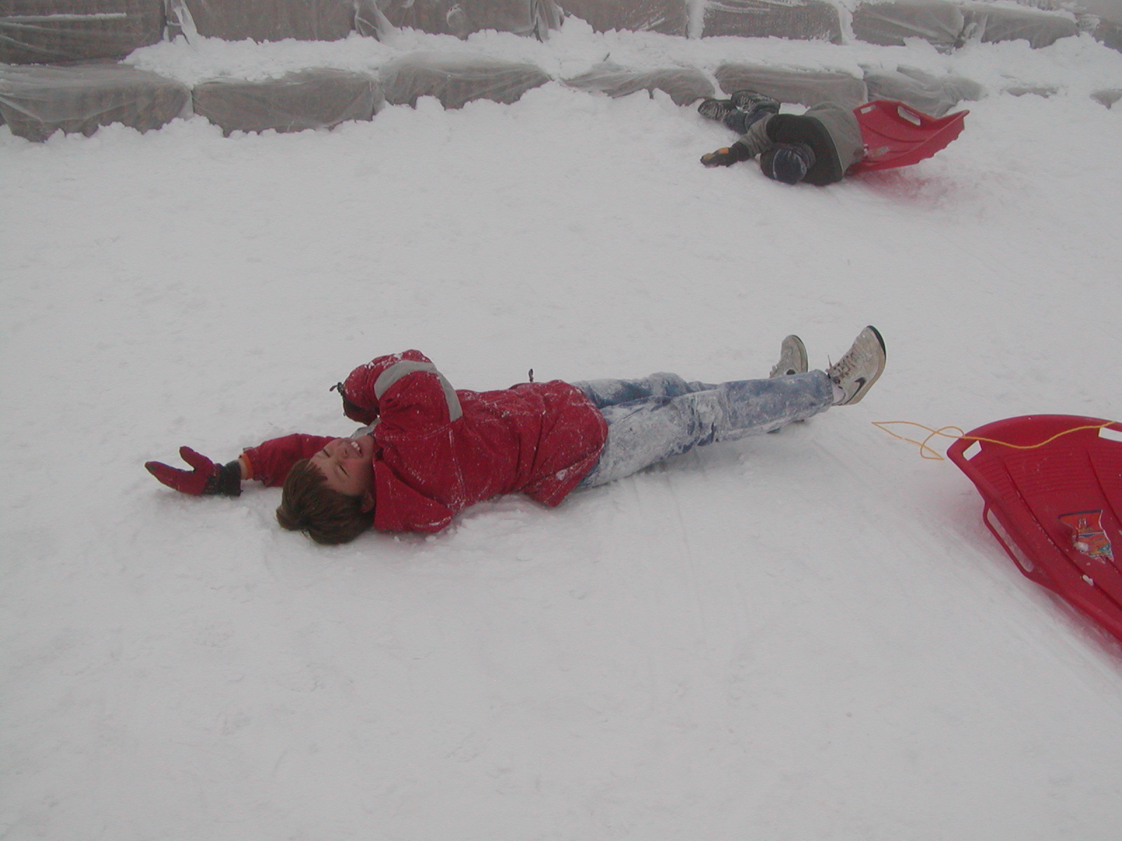 Austin and Josh Crash at End of Sled Run.