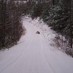 Sleding Down Road Beside House