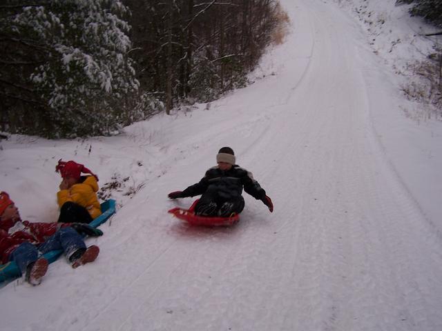 Austin & Josh Wipe Out On Blue Sled And Dustin Stops Just Before Hitting Them.