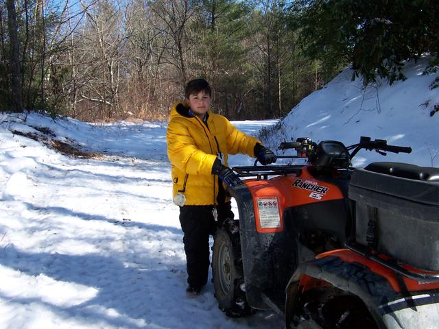 Josh Getting Ready To Get On 4 Wheeler To Go Sleding Again