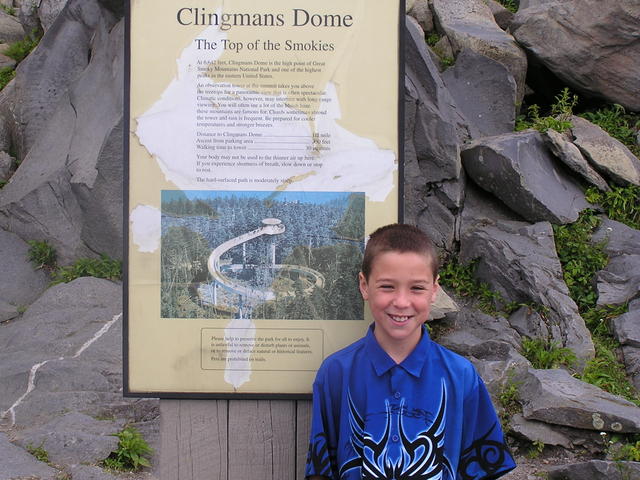 Dustin Standing In Front Of The History Of Clingmans Dome